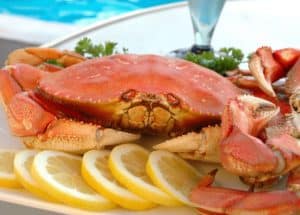 whole cooked crab with lemon